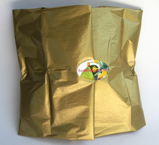 Tea Cosy Gift wrapped in gold tissue