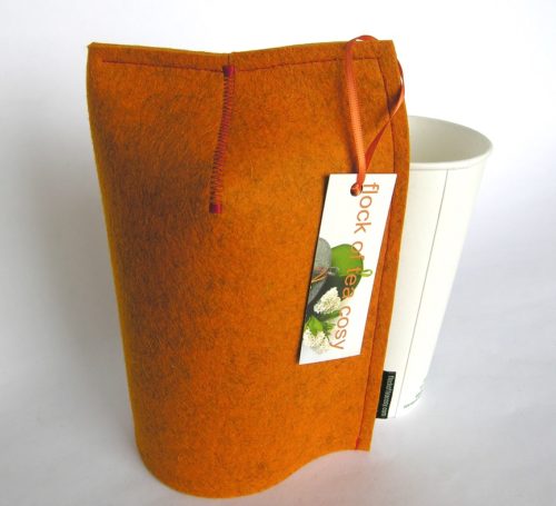 Modern minimalist mug cosy in orange wool felt with 20oz takeout cup