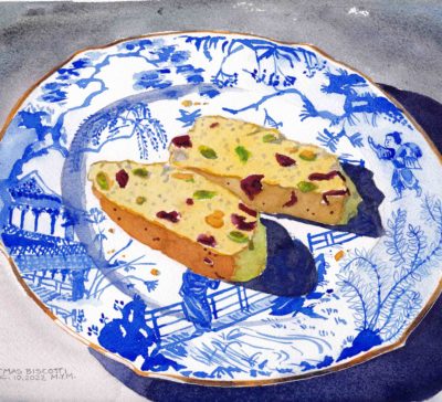 Watercolor painting of two Christmas biscotti cookies on a blue and white Royal Crown Derby plate